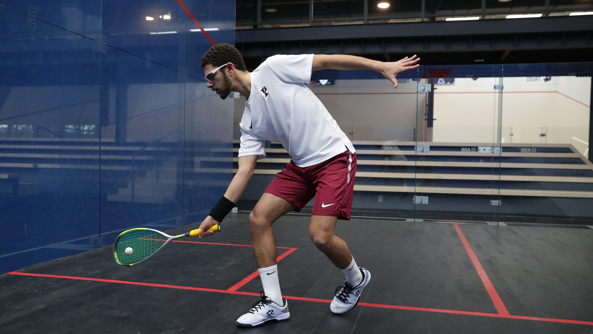Aly Abou Eleinen hits the ball down by his feet.