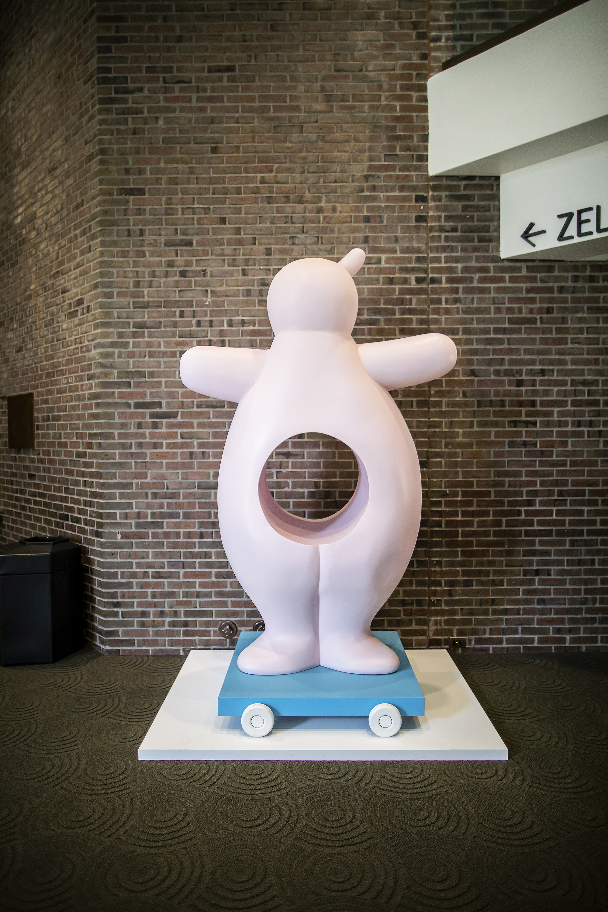 Amorphous whimsical character as a statue