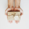 hands holding small gift box