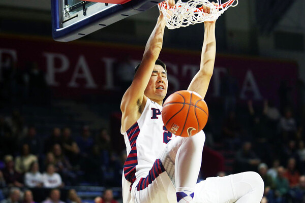 Michael Wang dunks the ball at The Palestra