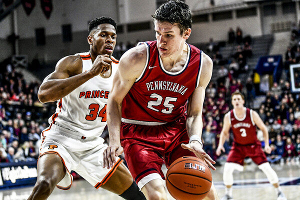 AJ Brodeur dribbles to the basketball against Princeton at the Palestra.