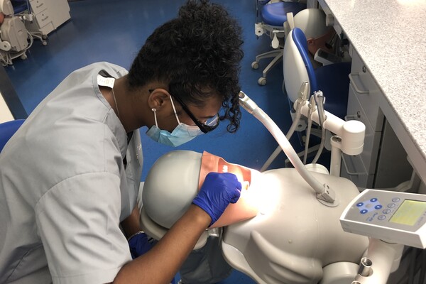 student works in Penn Dental's simulation lab