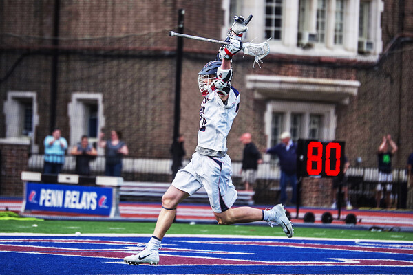 Freshman attacker Sam Handley celebrates after scoring the game-winning goal against Yale at Franklin Field.