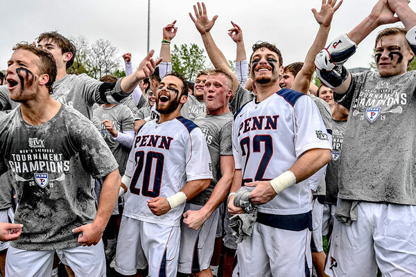 Men's lacrosse players celebrate after defeating Yale in the Ivy League Tournament title game.
