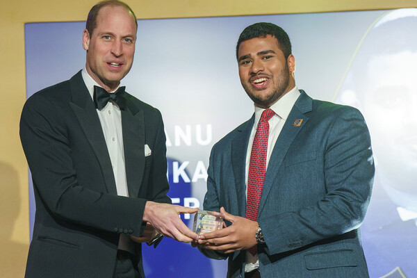 Prince William presenting an award to Gobhanu Sasankar Korisepati,